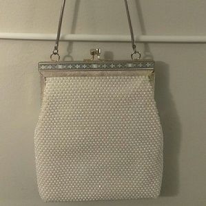 Cream colored beaded purse